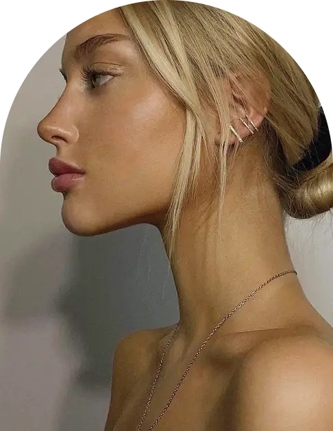 Side profile of a client showing a refined nasal bridge after a liquid nose job at Juvly Aesthetics
