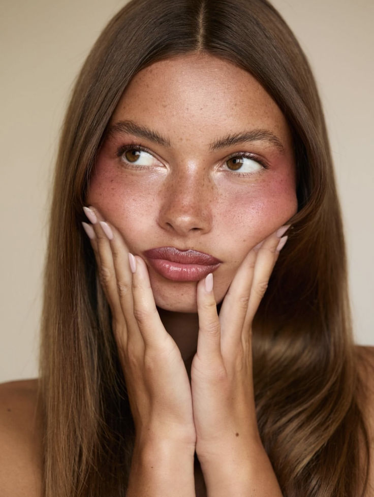Close-up portrait of a woman with lifted, balanced facial contours after a Mini JLyft